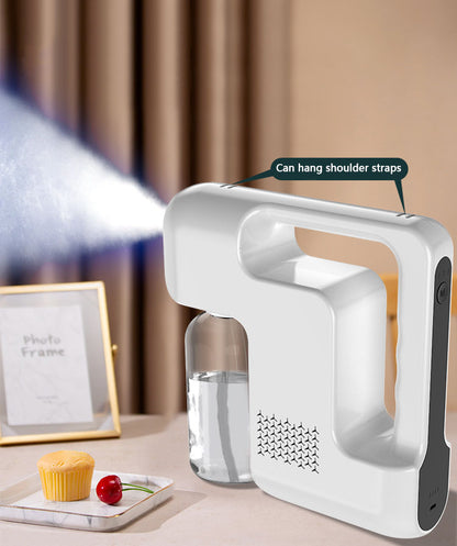 Hand-held wireless nano spray disinfection gun blue ray disinfection gun rechargeable spray gun alcohol atomization spray machine